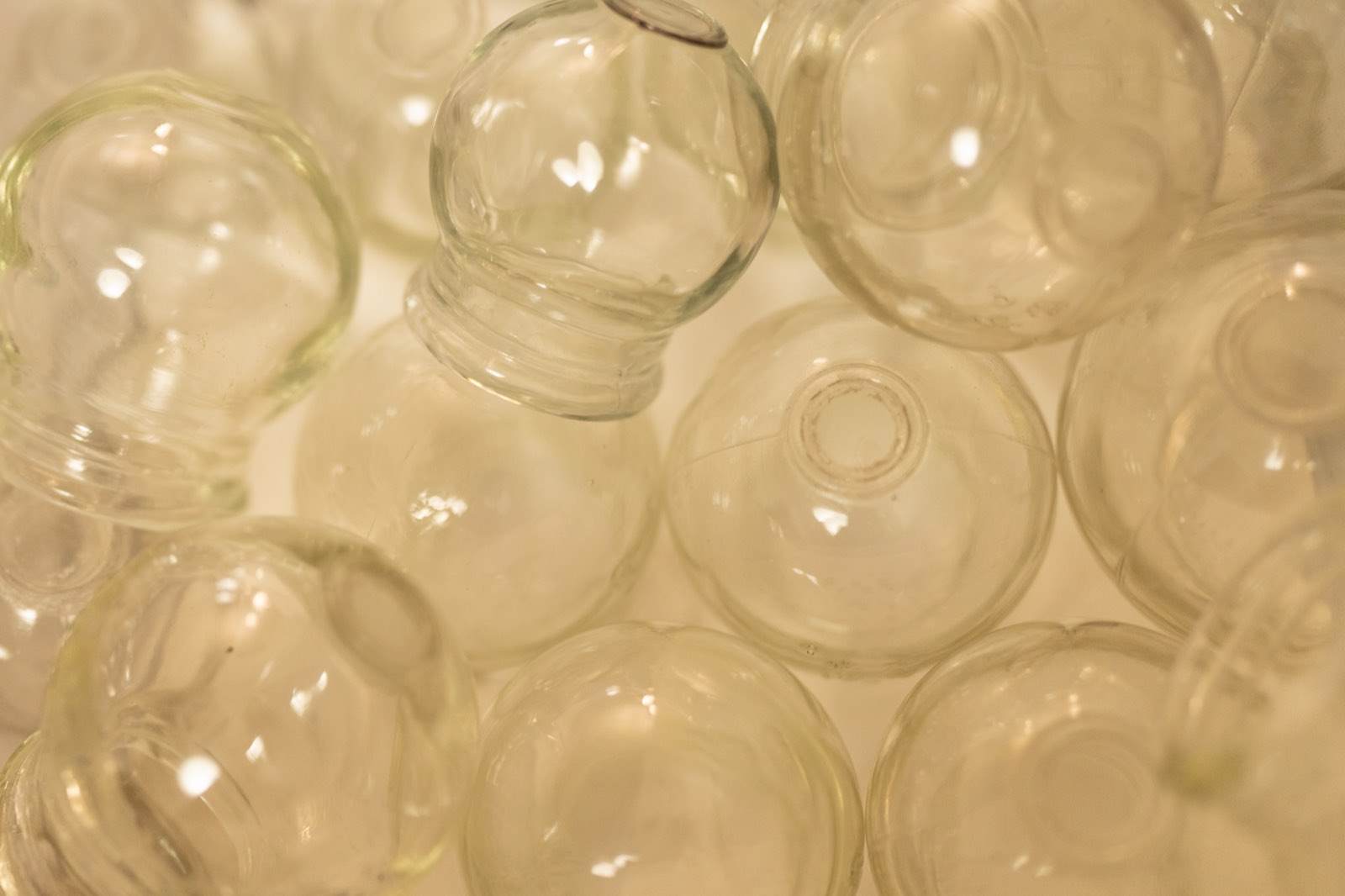Close-up of glass cups used for cupping therapy